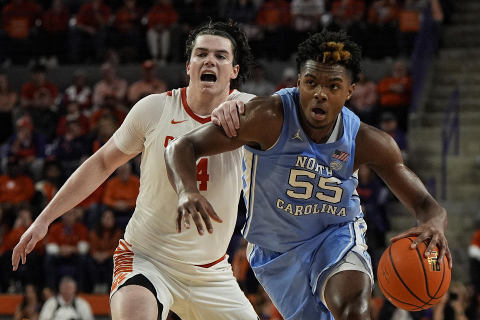 North Carolina forward Harrison Ingram (55) moves against Clemson forward Ian Schieffelin (4) during the second half of an NCAA college basketball game, Saturday, Jan. 6, 2024, in Clemson, S.C. AP Photo/Mike Stewart)