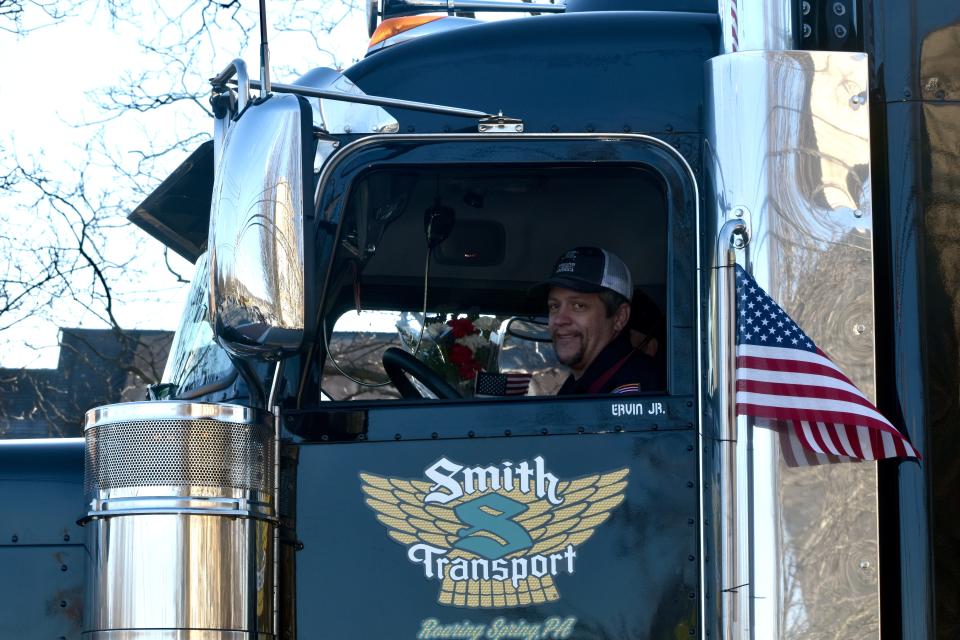 Ervin Henschel Jr. of Pennsylvania drove a delivery of holiday wreaths for Wreaths Across America through the village of Goshen on Wednesday.