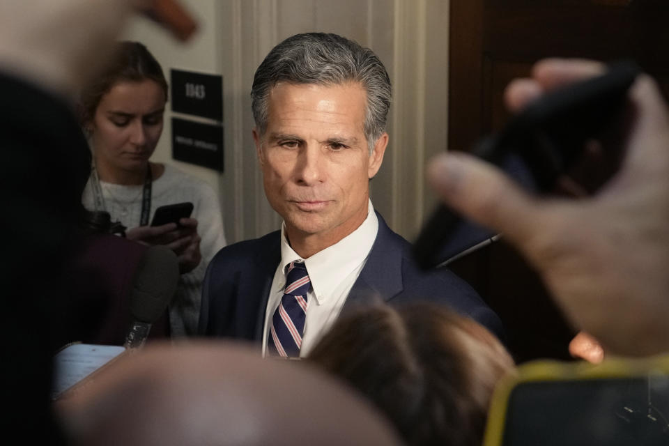 Rep. Dan Meuser, R-Pa., tells reporters he is out of the race for House speaker as Republicans meet to decide who to nominate to be the next speaker, on Capitol Hill in Washington, Monday, Oct. 23, 2023. (AP Photo/Alex Brandon)