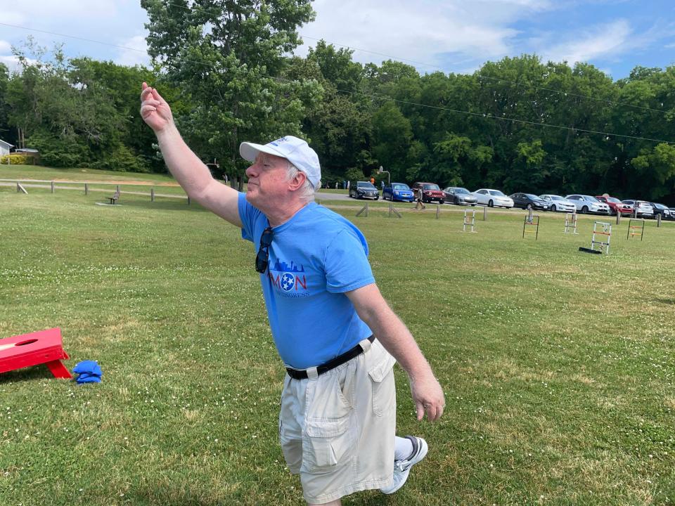 Mark Harmon, Democratic Senate candidate for District 2, said he enjoys a good game of cornhole at the first Spring Lawn Games Festival held at Carl Cowan Park Sunday, May 22, 2022.