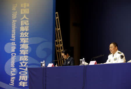 Qiu Yanpeng, deputy commander of the People's Liberation Army (PLA) Navy, speaks at a news conference ahead of the 70th anniversary of the founding of Chinese People's Liberation Army Navy, in Qingdao, China, April 20, 2019. REUTERS/Jason Lee