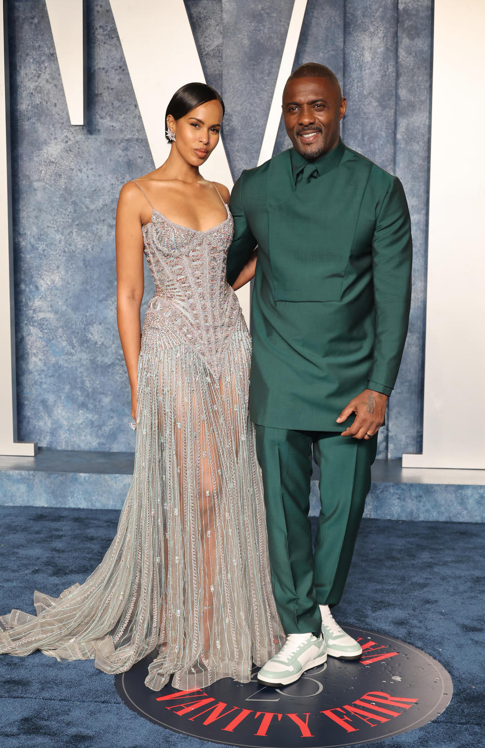 BEVERLY HILLS, CALIFORNIA - MARCH 12: Idris Elba (R) and Sabrina Dhowre Elba attend the 2023 Vanity Fair Oscar Party Hosted By Radhika Jones at Wallis Annenberg Center for the Performing Arts on March 12, 2023 in Beverly Hills, California. (Photo by Amy Sussman/Getty Images)
