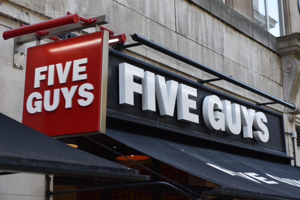 LONDON, ENGLAND- MAY 13: A general view of the signage of a Five Guys restaurant in Argyll Street. Source: Getty