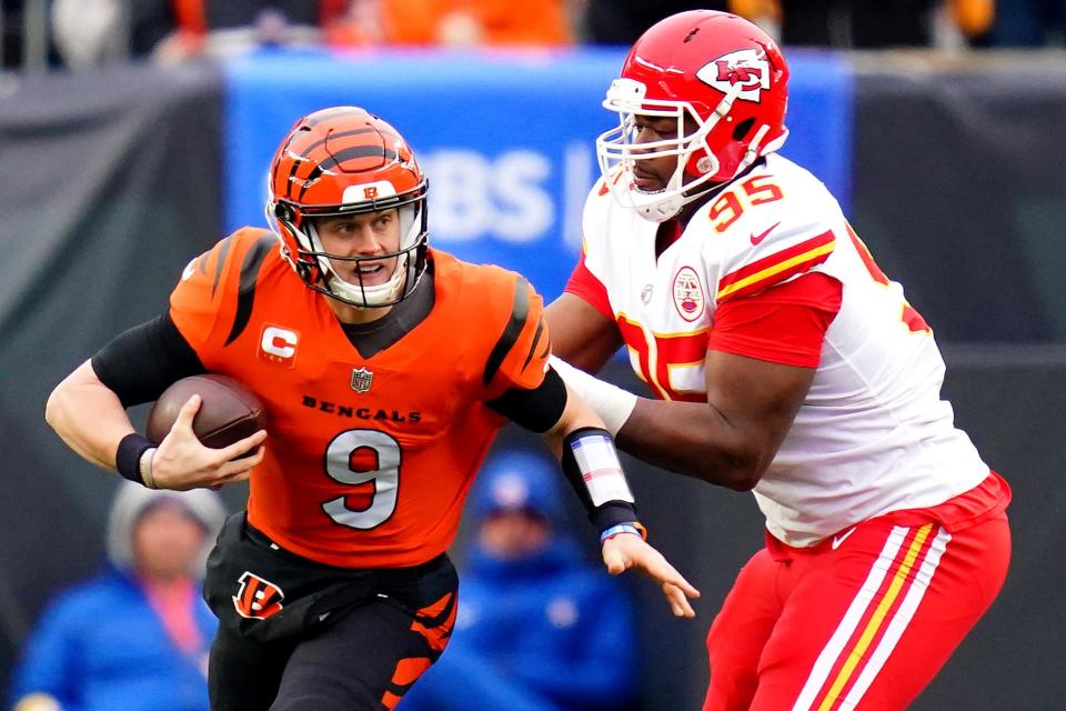 Cincinnati Bengals quarterback Joe Burrow (9) is sacked by Kansas City Chiefs defensive end Chris Jones (95) in the first quarter during a Week 17 NFL game, Sunday, Jan. 2, 2022, at Paul Brown Stadium in Cincinnati.