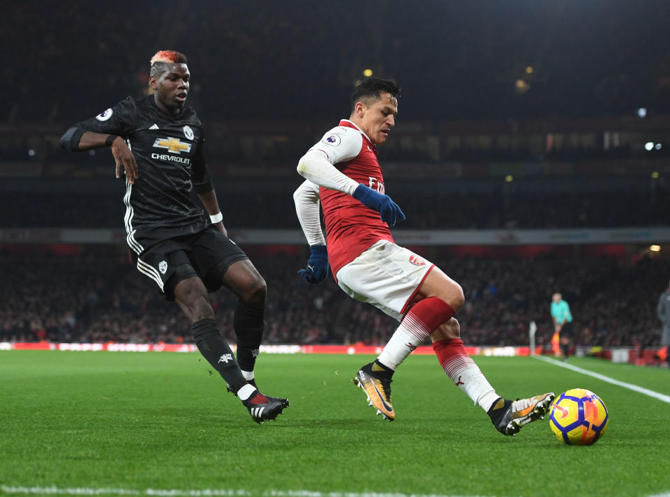 Alexis Sanchez (right) during a 2017 game against Manchester United. (Getty)