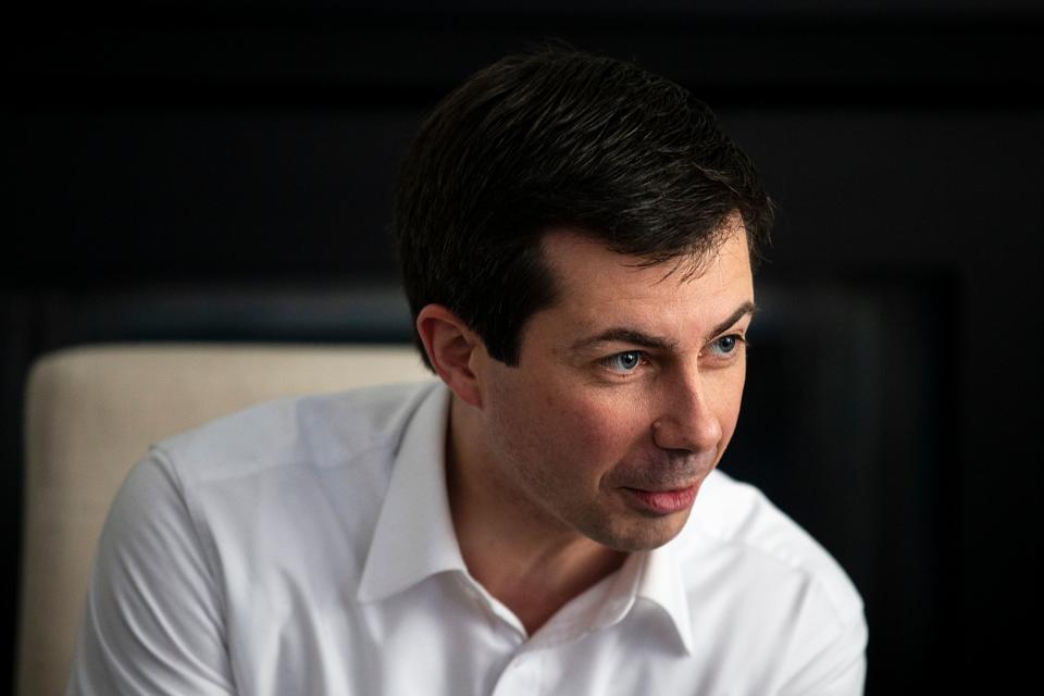 Pete Buttigieg, mayor of South Bend, Ind., answers questions from Iowans on Saturday, Feb. 9, 2018, in the living room of a home in Johnston. Buttigieg is exploring a run for president.