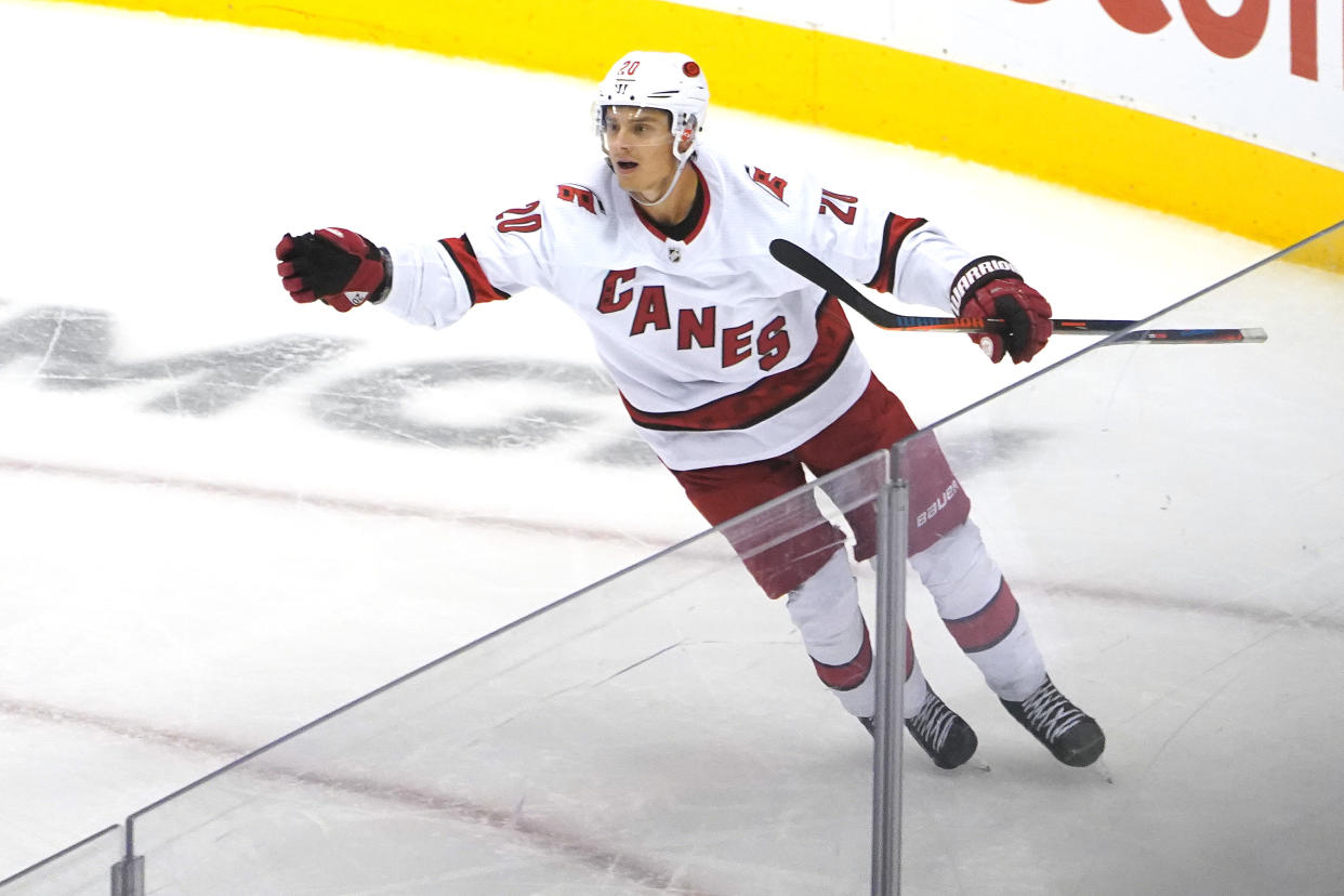 TORONTO, ONTARIO - AUGUST 04: Sebastian Aho #20 of the Carolina Hurricanes celebrates after scoring a goal on Igor Shesterkin #31 of the New York Rangers during the third period in Game Three of the Eastern Conference Qualification Round prior to the 2020 NHL Stanley Cup Playoffs at Scotiabank Arena on August 04, 2020 in Toronto, Ontario, Canada. (Photo by Andre Ringuette/Freestyle Photo/Getty Images)