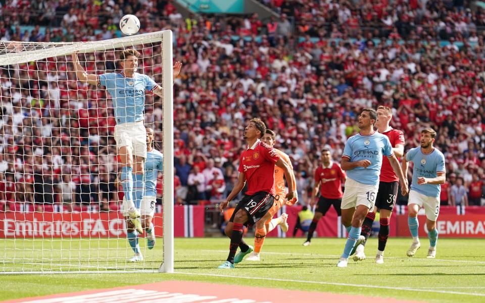 Manchester United's Scott McTominay (2nd right) looks on as his shot goes over the bar during the Emirates FA Cup final - PA/Martin Rickett