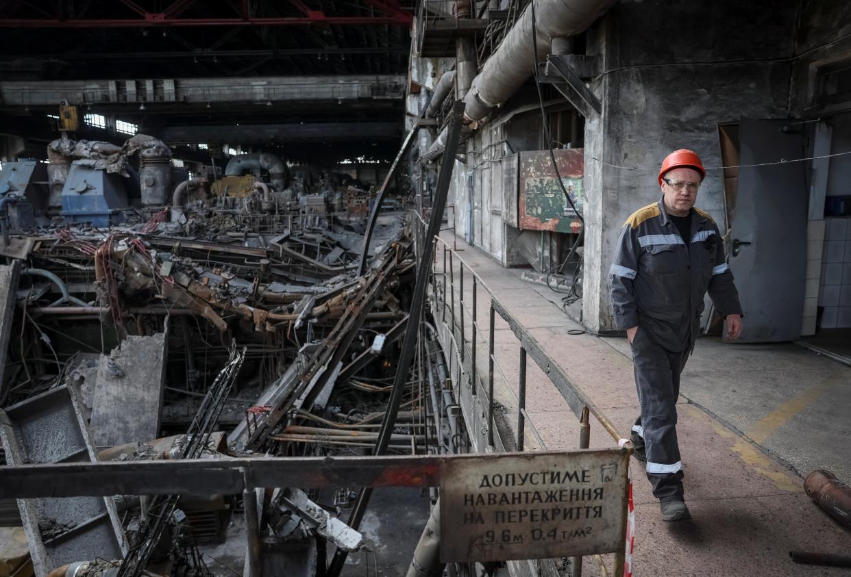 A worker walks at a thermal power plant damaged by recent Russian missile strike (REUTERS)