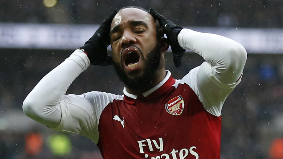 Alexandre Lacazette reacts to missing a gilt-edged chance against Tottenham