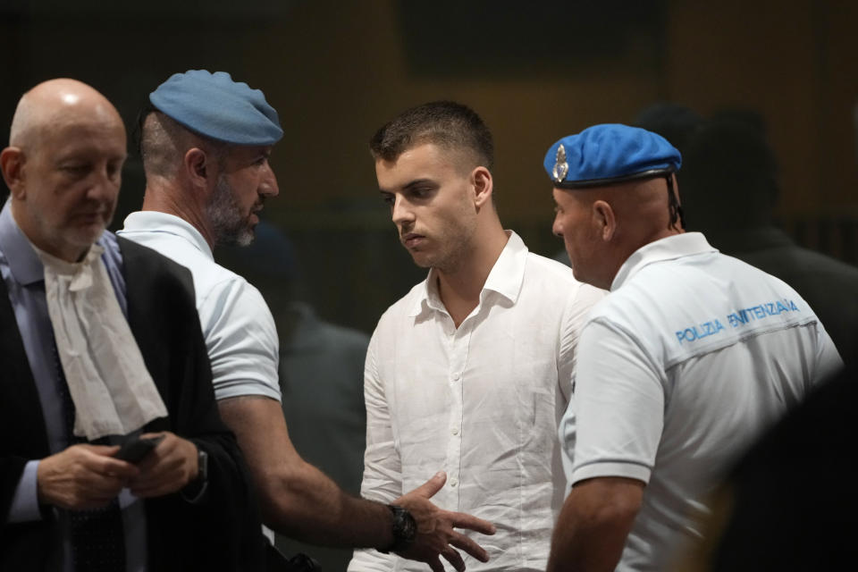 Gabriel Natale Hjorth leaves at the end of a hearing for the appeals trial in which he is facing murder charges for killing Italian Carabinieri paramilitary police officer Mario Cerciello Rega, in Rome, Wednesday, July 3, 2024. Two American men face a new trial in the slaying of an Italian plainclothes police officer during a botched sting operation after Italy's highest court threw out their convictions. (AP Photo/ Alessandra Tarantino)