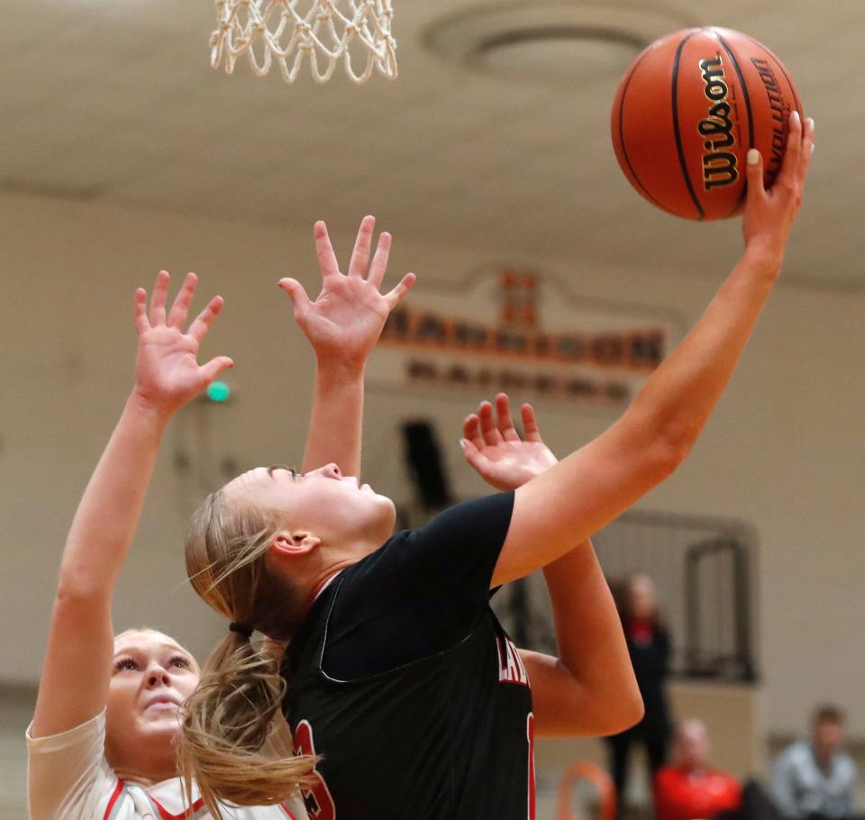 Rensselaer Central Bombers Taylor Van Meter (13) shoots the ball during the IU Health Hoops Classic Girl’s Basketball Championship against the West Lafayette Red Devils, Saturday, Nov. 18, 2023, at Harrison High School in West Lafayette, Ind. Rensselaer Central Bombers won 58-53.