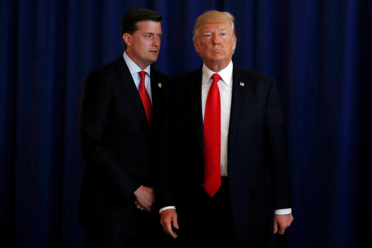 Then-White House staff secretary Rob Porter is seen with President Donald Trump in August. (Photo: Jonathan Ernst / Reuters)