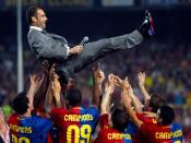 FILE PHOTO: Barcelona coach Pep Guardiola is tossed by players during celebrations of the Spanish La Liga title triumph at Camp Nou stadium.