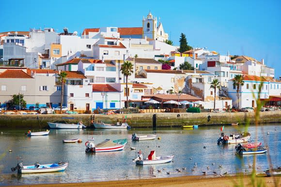 Scenic view of fishing boats in Ferragudo, Algarve, Portugal