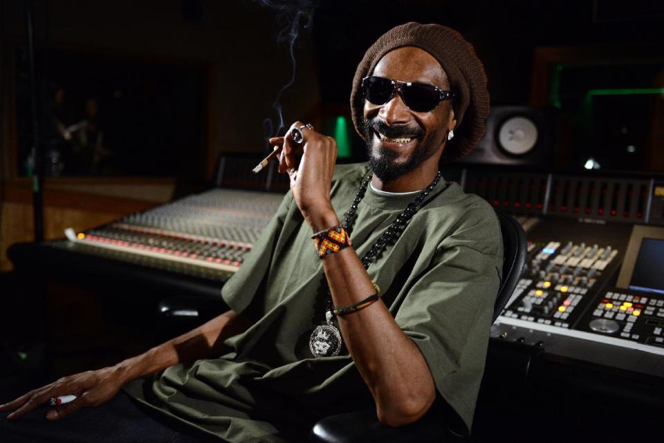 In this Tuesday, March 5, 2013 photo, Snoop Lion poses for a portrait at the Westlake Recording Studios in Los Angeles. How committed is Snoop Dogg to his new moniker Snoop Lion? He is using the name to release a reggae- and dancehall-focused album releasing on April 23, 2013. (Photo by Jordan Strauss/Invision/AP)