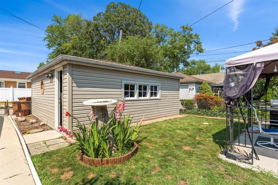 the detached garage and small backyard at a house for sale near chicago