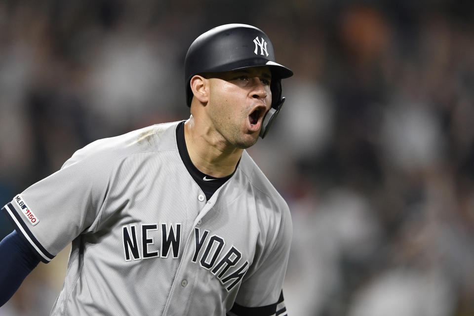 New York Yankees' Gary Sanchez reacts as he heads to first to round the bases after hitting a three-run home run during the ninth inning of a baseball game against the Baltimore Orioles, Monday, May 20, 2019, in Baltimore. (AP Photo/Nick Wass)