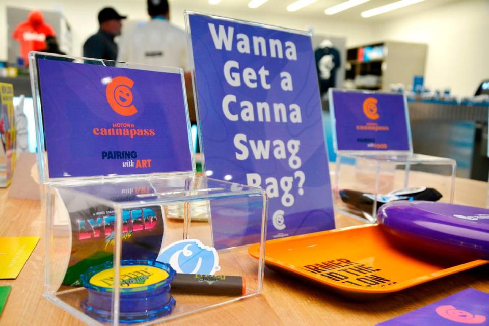 Some of the MoTown CannaPass information pamphlets and swag bag items on display at Cookies cannabis dispensary in Modesto, Calif.