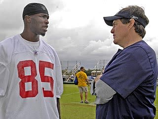 Patriots coach Bill Belichick shares a moment with Chad Ochocinco during practice for the 2007 Pro Bowl