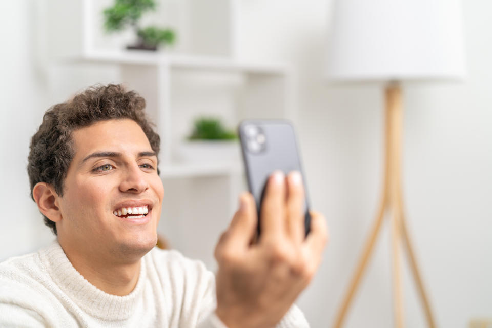 They kept in touch via FaceTime calls but it wasn't enough to keep Emily* happy. Posed by model. (Getty Images)