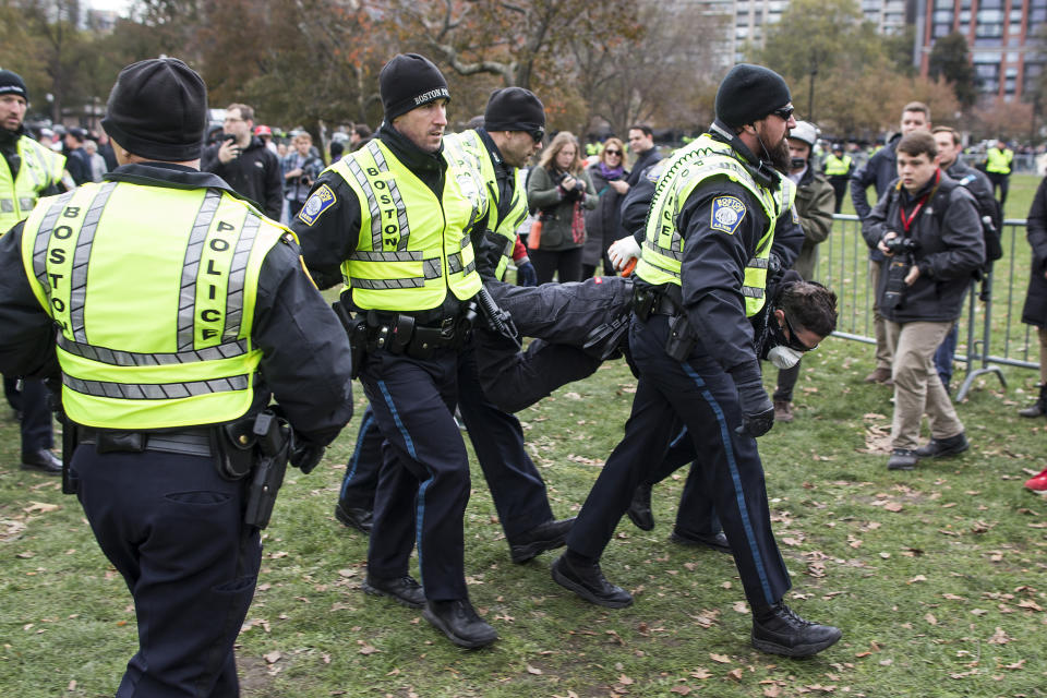 <p>A counterprotester of an Alt-Right organized free speech event on the Boston Common is arrested on Nov. 18, 2017, in Boston, Mass. (Photo: Scott Eisen/Getty Images) </p>