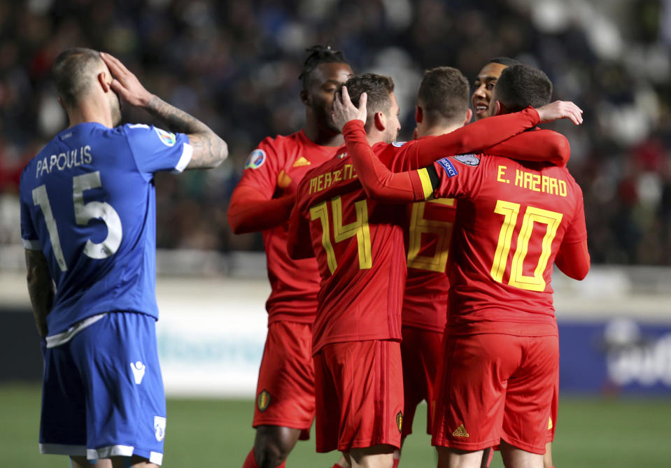 Belgium players celebrate a goal against Cyprus during the Euro 2020 group I qualifying soccer match between Cyprus and Belgium at the GSP stadium in Nicosia, Cyprus, Sunday, March 24, 2019. (AP Photo/Philippos Christou)