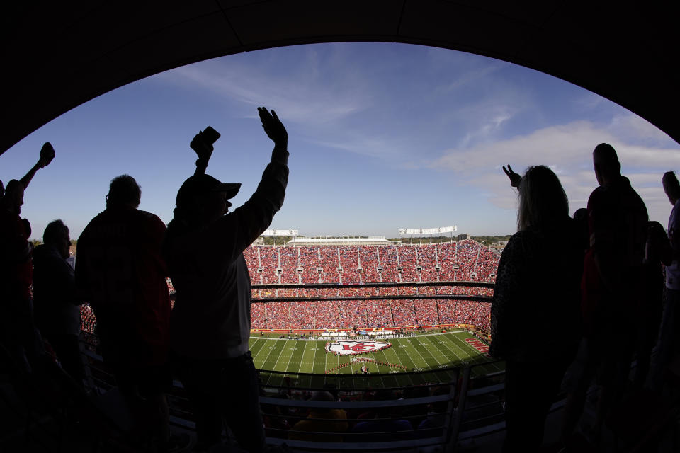 Fans cheer during the first half of an NFL football game between the Kansas City Chiefs and the Buffalo Bills Sunday, Oct. 16, 2022, in Kansas City, Mo. (AP Photo/Charlie Riedel)