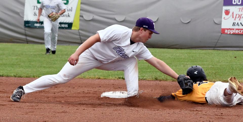 Triway short stop Grant Schag tags out Beachwood's Brenden Malek at second base on a steal attempt.