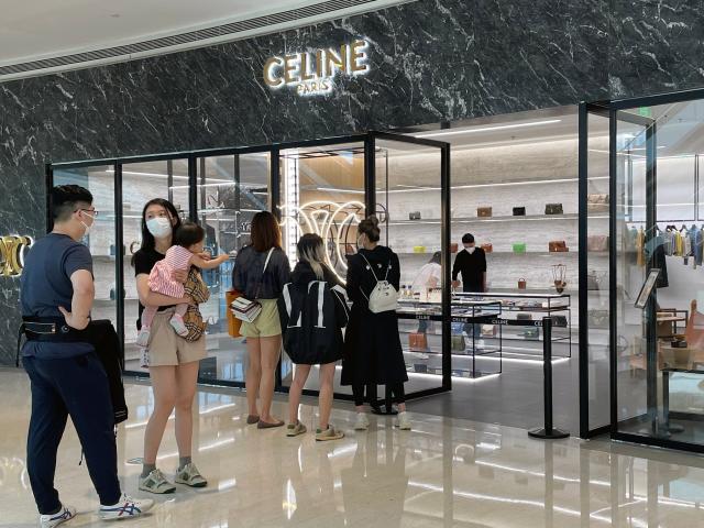 Fashion-obsessed Shanghai residents flocked to luxury stores on the first  day of the city's reopening after its brutal lockdown