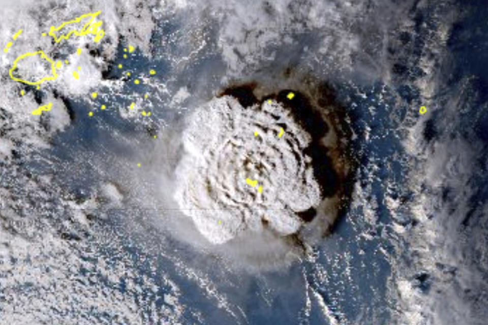 FILE - This satellite image made by the Japanese weather satellite Himawari-8 shows the eruption of the Hunga Tonga-Hunga Ha'apai undersea volcano at the Pacific nation of Tonga on Jan. 15, 2022. Scientists say by far the biggest cause of the recent extreme warming is human-caused climate change and a natural El Nino. But some say there’s got to be something more. (Japan Meteorology Agency via AP, File)