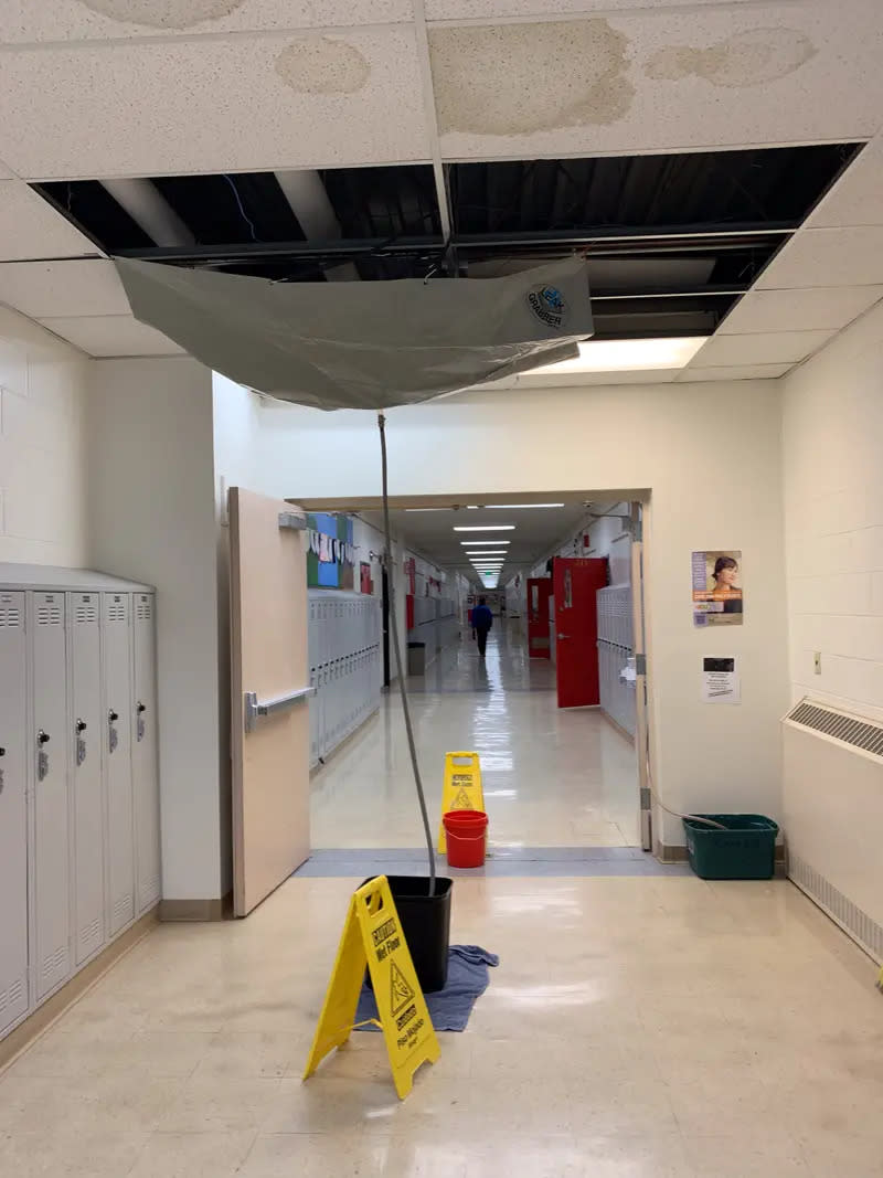 <span class="attribution__caption">“In one area, after a particularly hard snow was melting, the custodians rigged up a tarp across the ceiling to catch all the leaks and funnel them into garbage cans and plastic totes that they could dump,” said Moscow School District teacher Cyndi Faircloth.</span> <span class="attribution__credit"> Courtesy of Rachel Aiello </span>