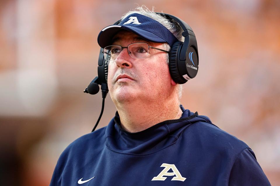 Akron head coach Joe Moorhead watches a play on the Jumbotron during the first half against Tennessee, Saturday, Sept. 17, 2022, in Knoxville, Tenn.