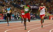 Kirani James of Grenada (2nd R) crosses the line to win the men's 400 metres at the 2014 Commonwealth Games in Glasgow, Scotland, July 30, 2014. REUTERS/Phil Noble