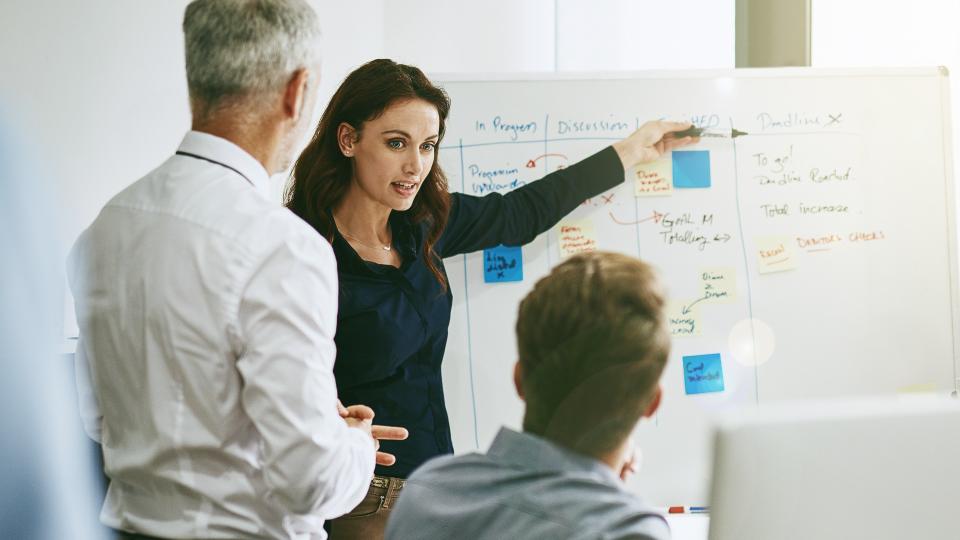 Shot of a group of business colleagues meeting in an office.