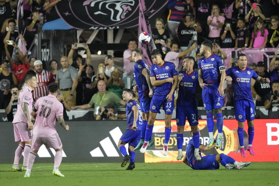 Inter Miami forward Lionel Messi (10) makes a free kick to score a goal during the second half of a Leagues Cup soccer match against Cruz Azul, Friday, July 21, 2023, in Fort Lauderdale, Fla. Inter Miami defeated Cruz Azul 2-1. (AP Photo/Rebecca Blackwell)