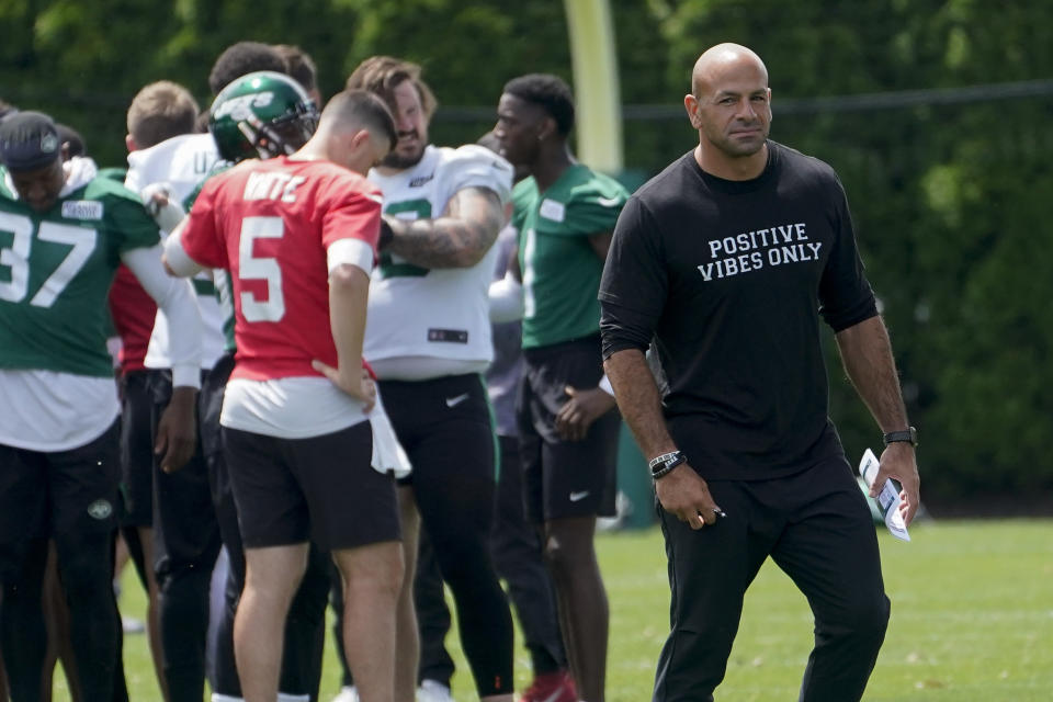 FILE - New York Jets head coach Robert Saleh walks the field as his players take part in drills at the NFL football team's practice facility, Tuesday, June 14, 2022, in Florham Park, N.J. Saleh’s first season as coach of the New York Jets was a rough one. (AP Photo/John Minchillo, File)