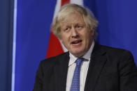 FILE - Britain's Prime Minister Boris Johnson speaks during a media briefing on COVID-19, in Downing Street, London, Dec. 15, 2021. Fighting for his career, British Prime Minister Boris Johnson has one constant refrain: Wait for Sue Gray. Gray is a senior civil servant who may hold Johnson’s political future in her hands. She has the job of investigating allegations that the prime minister and his staff attended lockdown-flouting parties on government property. (Tolga Akmen/Pool via AP, File)