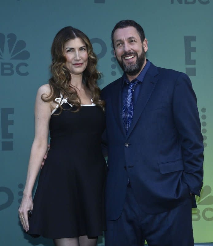 Adam Sandler and wife, Jackie Sandler, attend the People's Choice Awards at the Barker Hangar in Santa Monica, Calif., on Sunday. Photo by Jim Ruymen/UPI