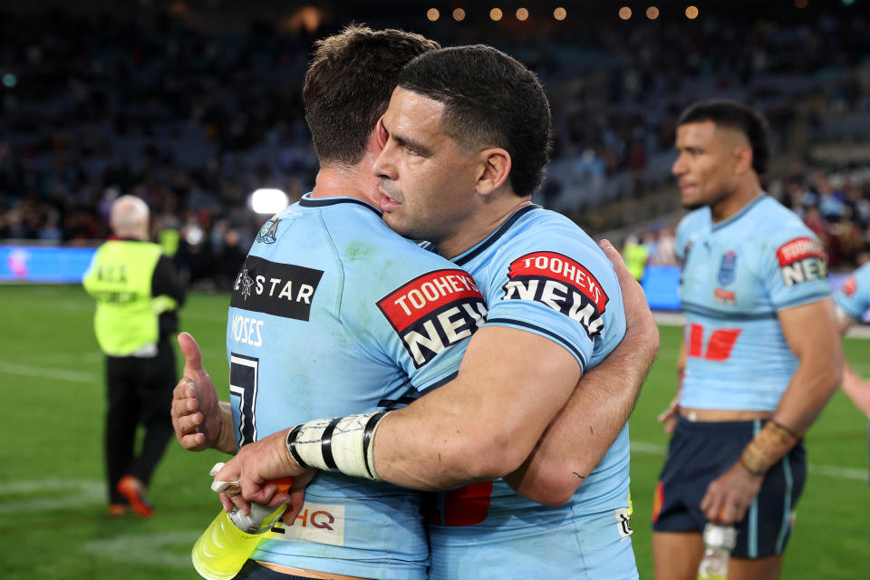 SYDNEY, AUSTRALIA - JULY 12:  Mitchell Moses of the Blues and Cody Walker of the Blues celebrate after winning game three of the State of Origin series between New South Wales Blues and Queensland Maroons at Accor Stadium on July 12, 2023 in Sydney, Australia. (Photo by Mark Kolbe/Getty Images)