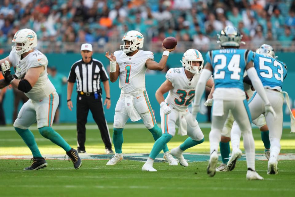 Dolphins quarterback Tua Tagovailoa, passing against the Panthers last Sunday, has completed more than 80 percent of his passes the last two games.