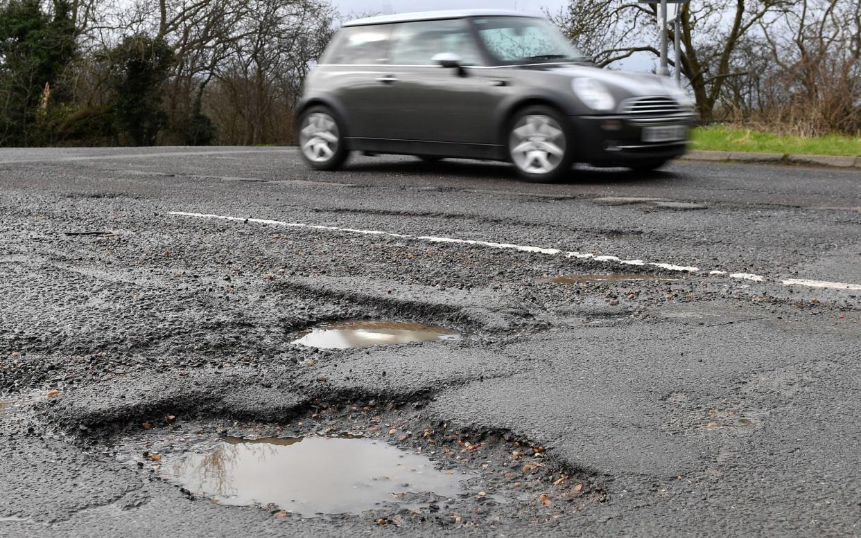 Alarm report estimates that more than £14 billion is now needed to fix all of England and Wales’ potholes - Joe Giddens/PA