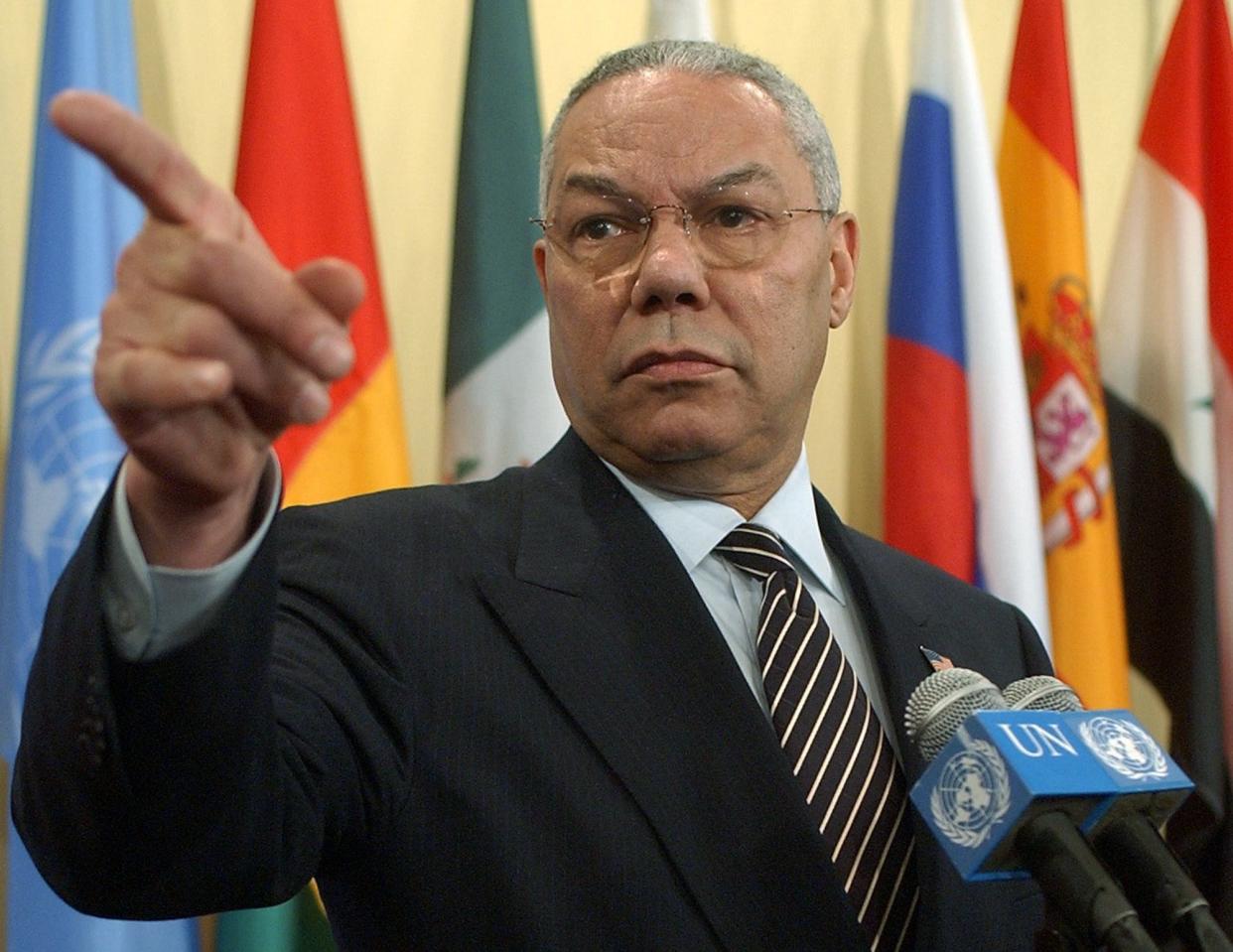 U.S. Secretary of State Colin Powell points to a reporter during a news conference outside of the United Nations Security Council Chambers on March 7, 2003. 