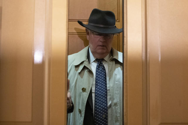 FILE - Ken Starr, an attorney for President Donald Trump, takes an elevator as he arrives on Capitol Hill, Feb. 3, 2020 in Washington. Starr, whose criminal investigation of Bill Clinton led to the president’s impeachment, died Sept. 13, 2022. He was 76. (AP Photo/Alex Brandon, File)