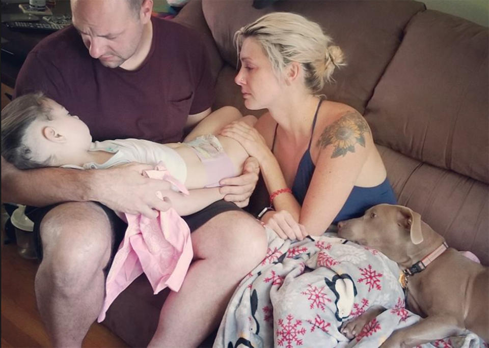 Five-year-old Zoey spent her final moments held by her parents Casey and Ben Daggett, watching one of her favorite movies. Source: Zoey’s Fight