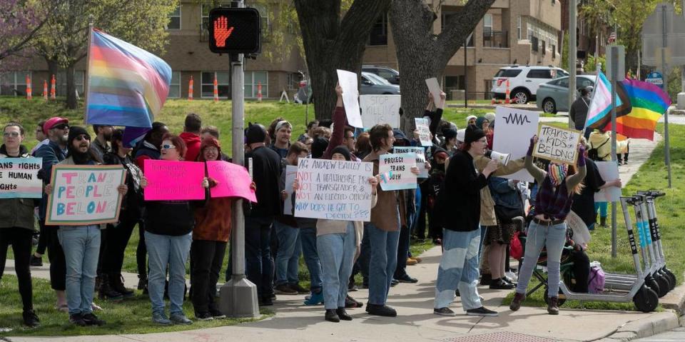 Transgender rights supporters gathered Sunday, April 16 at Mill Creek Park on the plaza to protest Missouri Attorney General Andrew Bailey’s emergency rules that will essentially ban gender-affirming care for many adults and minors in Missouri.