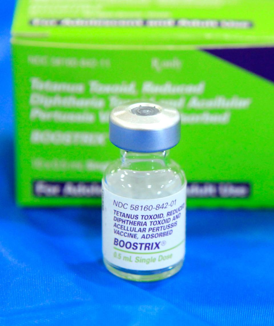 An empty bottle of tetanus, diphthera and pertussis, (whooping cough) vaccine is shown.