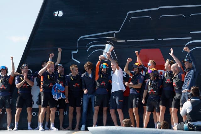 Ineos Britannia’s team celebrate their victory in the Vuitton Cup