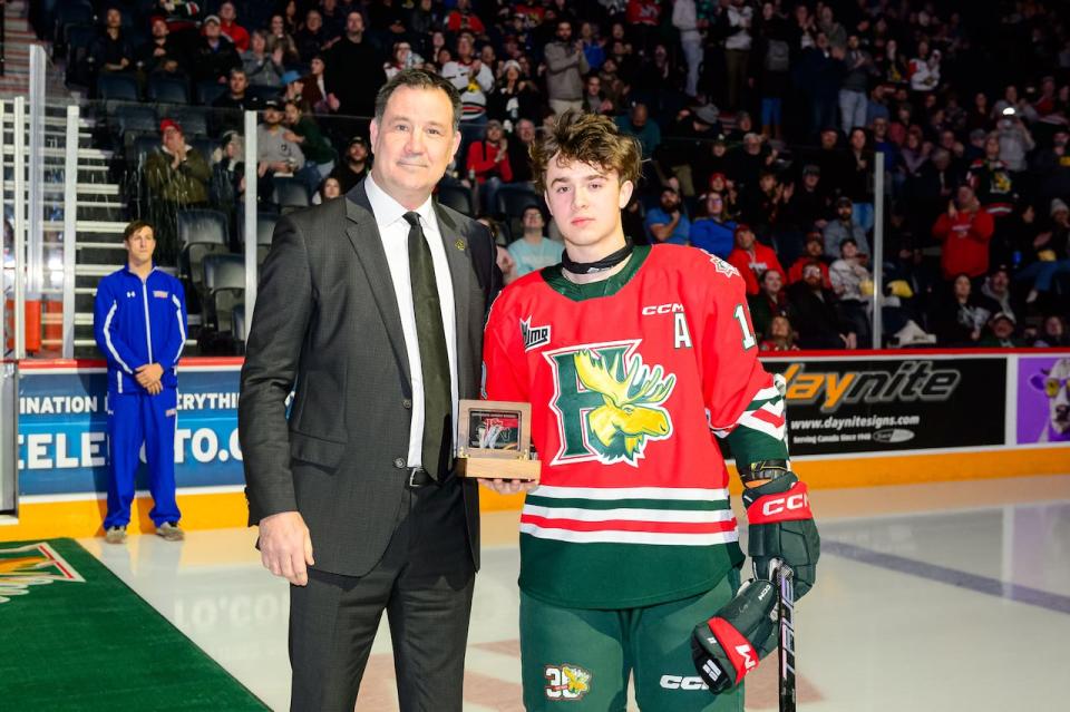 Halifax Mooseheads forward Jordan Dumais is honoured during a pregame ceremony on Dec. 7, 2023. Dumais was invited to last year's world junior selection camp, but didn't make the team.