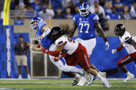 Kentucky quarterback Will Levis (7) is tackled by Northern Illinois defensive end Roy Williams (97) during the first half of an NCAA college football game in Lexington, Ky., Saturday, Sept. 24, 2022. (AP Photo/Michael Clubb)